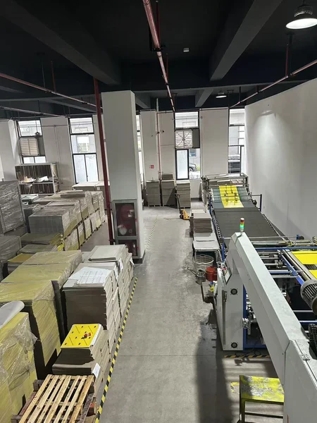 How Does a Flute Laminating Machine Work in Mouse Glue Board Production